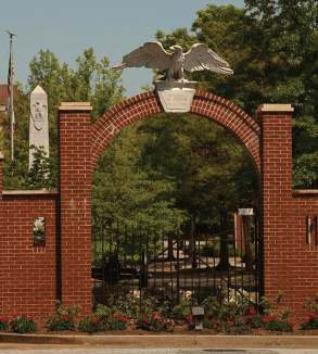 Brick arch with an eagle sculpture on top